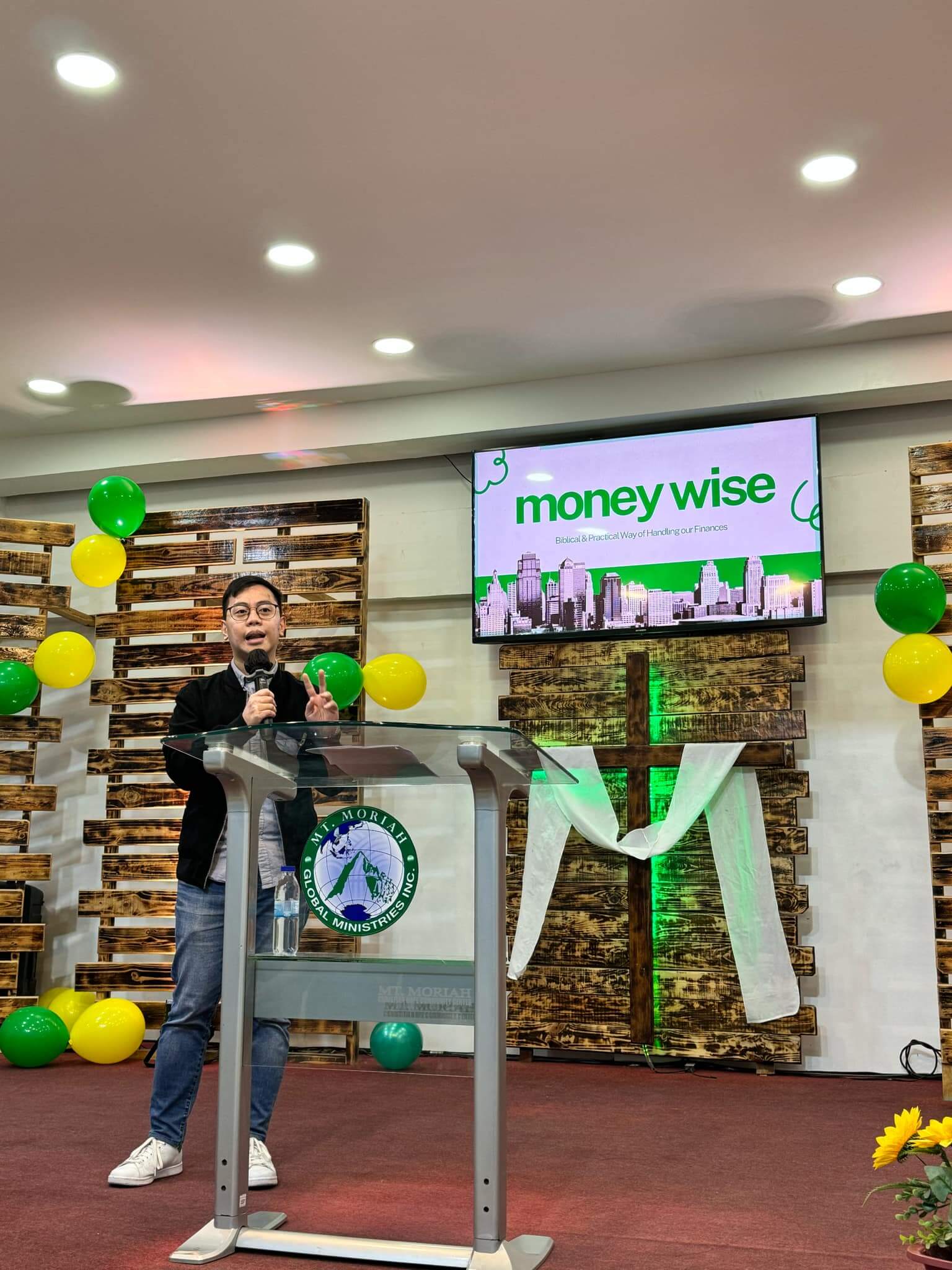 Mike Sevilla speaking at Money Wise event on financial literacy